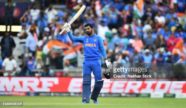 Rahul of India raises his bat after scoring 100 runs during the Group Stage match of the ICC Cricket World Cup 2019 between Sri Lanka and India at...