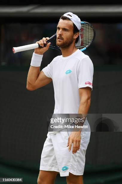 Joao Sousa of Portugal reacts in his Men's Singles third round match against Daniel Evans of Great Britain during Day six of The Championships -...
