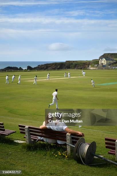 Spectators watch the action during the Cornwall Cricket League Division 2 East match between Bude CC and Menheniot/Looe CC at Crooklets Cricket...