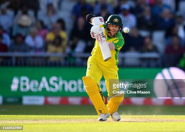 David Warner of Australia in action batting during the Group Stage match of the ICC Cricket World Cup 2019 between Australia and South Africa at Old...
