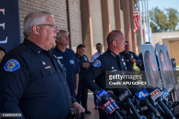 Police officer Lt Carl Whitney delivers a press conference on August 8, 2019 in front of the Garden Grove Police Department after a series of...