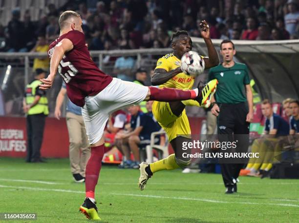 Sarajevo's Besim Serbecic battles for the ball with Hermaine Moukam of Bate Borisov during the UEFA Europa League third leg qualifying match between...