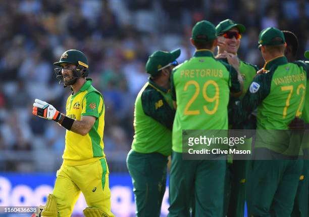 Glenn Maxwell of Australia walks off after being dismissed off the bowling of Kagiso Rabada of South Africa during the Group Stage match of the ICC...