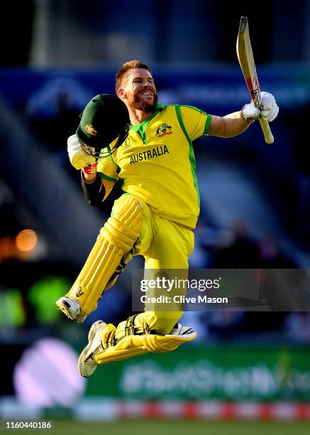 David Warner of Australia celebrates his century during the Group Stage match of the ICC Cricket World Cup 2019 between Australia and South Africa at...
