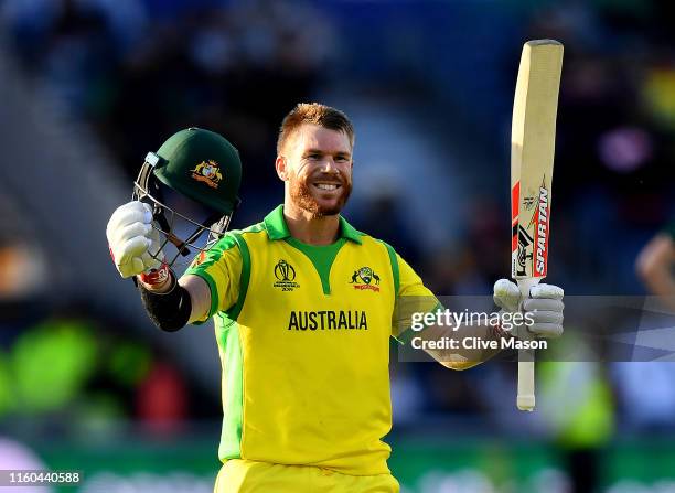 David Warner of Australia celebrates his century during the Group Stage match of the ICC Cricket World Cup 2019 between Australia and South Africa at...