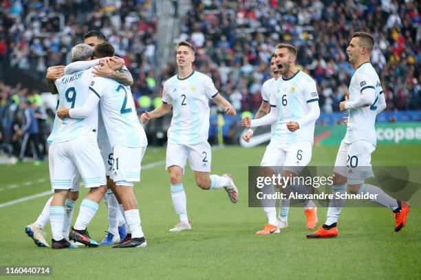 Sergio Aguero of Argentina celebrates with teammates after scoring the opening goal during the Copa America Brazil 2019 Third Place match between...