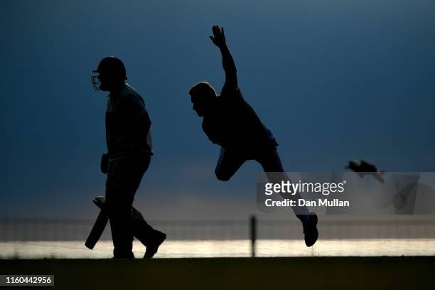 Bowler from Menheniot/Looe CC runs in to bowl during the Cornwall Cricket League Division 2 East match between Bude CC and Menheniot/Looe CC at...
