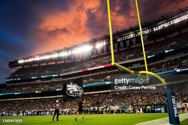 Philadelphia Eagles flag-bearer flies the team logo after the first score of the game against the Tennessee Titans during the first quarter of a...