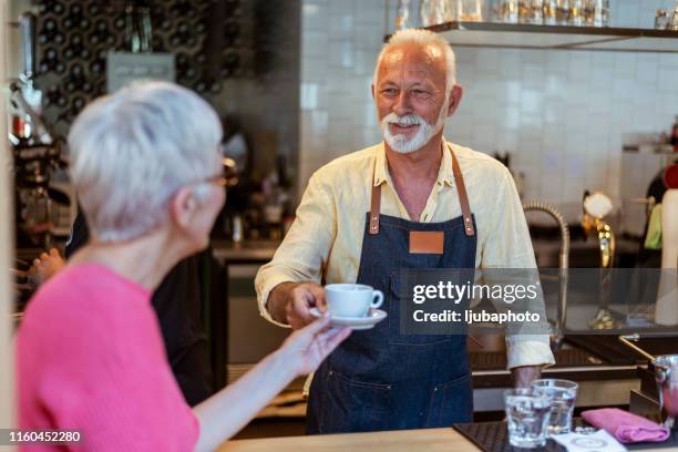 here's your coffee - loyalty stock pictures, royalty-free photos & images