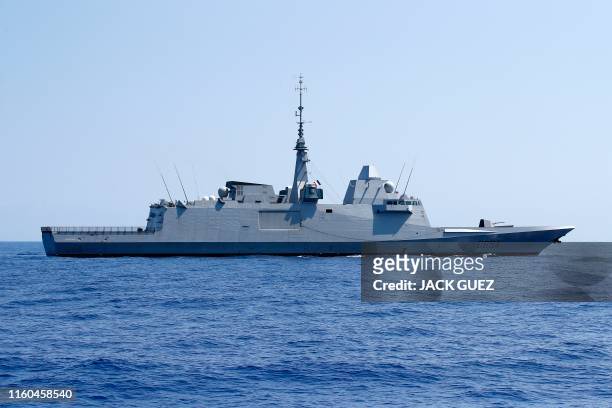 Photo taken on August 7 shows the French anti-submarine frigate FREMM Auvergne during an exercise how simulate a humanitarian response to a powerful...