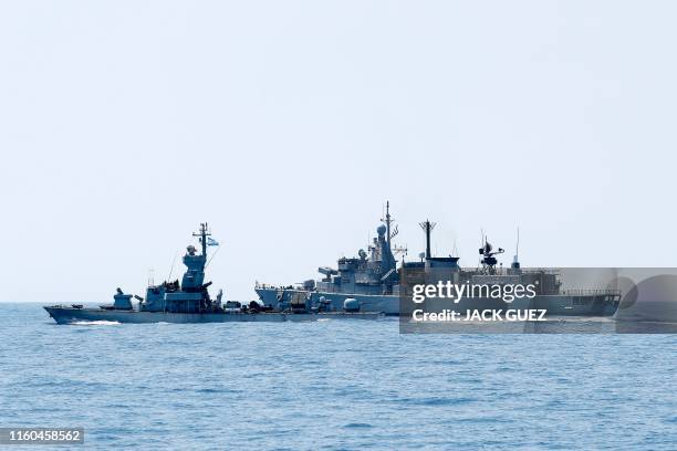 Photo taken on August 7 shows an Israeli Sa'ar Patrol 4.5 vessel and the Greek HS Aigaion frigate during an exercise how simulate a humanitarian...