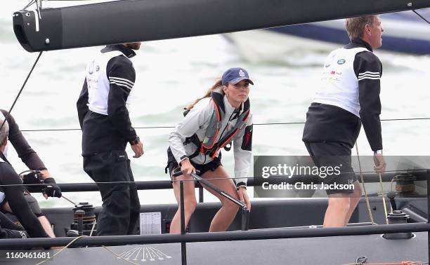 Catherine, Duchess of Cambridge at the helm competing on behalf of The Royal Foundation in the inaugural King's Cup regatta hosted by the Duke and...