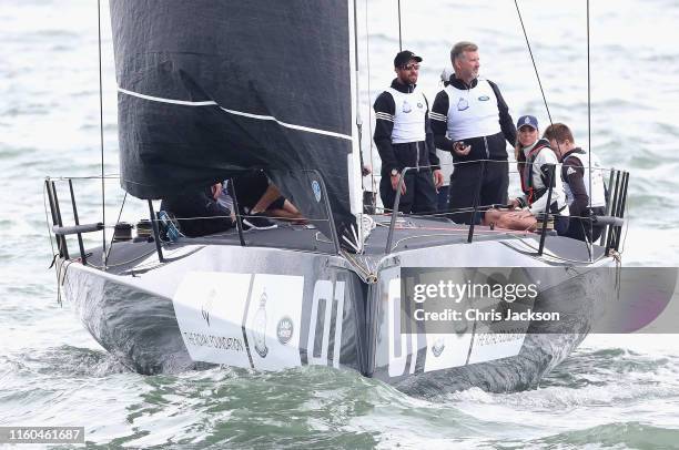 Catherine, Duchess of Cambridge at the helm competing on behalf of The Royal Foundation in the inaugural King's Cup regatta hosted by the Duke and...