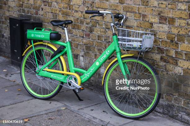 Lime-E electrical renting bicycle in London, UK on 1st August 2019. Lime E is an electric bike, pedal assisted with a range of 80-120km that unlocks...