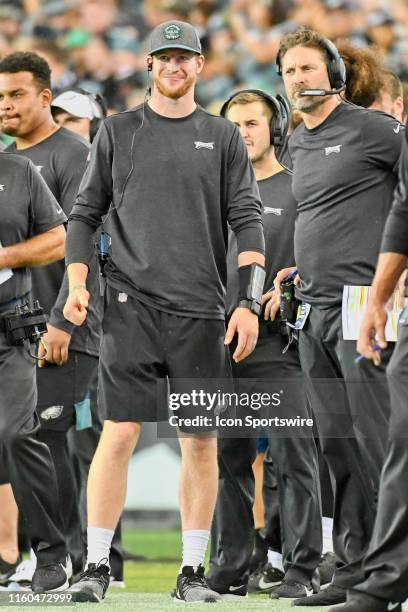 Philadelphia Eagles quarterback Carson Wentz and offensive coordinator Mike Groh look on during the game between the Tennessee Titans and the...