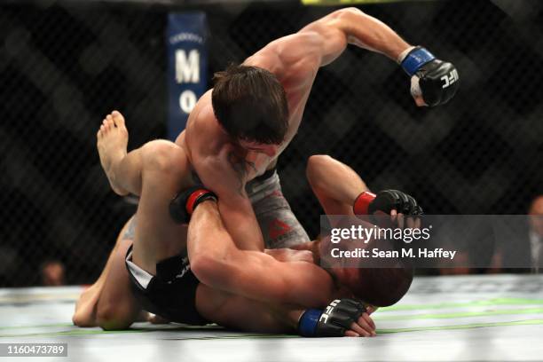 Chance Rencountre punches Ismail Naurdiev of Austria during their Welterweight bout at T-Mobile Arena on July 06, 2019 in Las Vegas, Nevada.