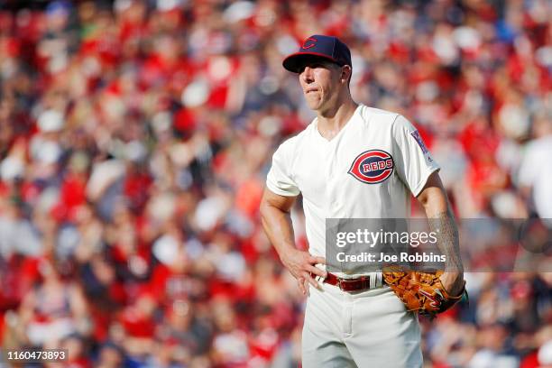 Michael Lorenzen of the Cincinnati Reds reacts after giving up a two-run home run to Roberto Perez of the Cleveland Indians to break a tie game in...
