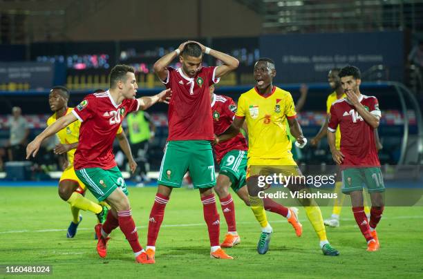 Hakim Ziyach of Morocco reacts after missing a penalty during the 2019 Africa Cup of Nations Round of 16 match between Morocco and Benin at Al Salam...
