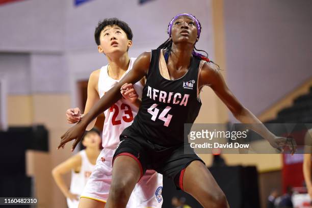 Kadidia Traore of Africa Girls boxes out Abudushalamu Abudurexiti of China during the Jr. NBA Global Championship Quarterfinals on August 9, 2019 at...