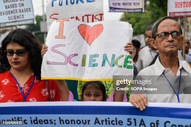 An Indian student holds a placard during the India March for Science in Kolkata. Scientists, scholars and students participate in 'India March for...