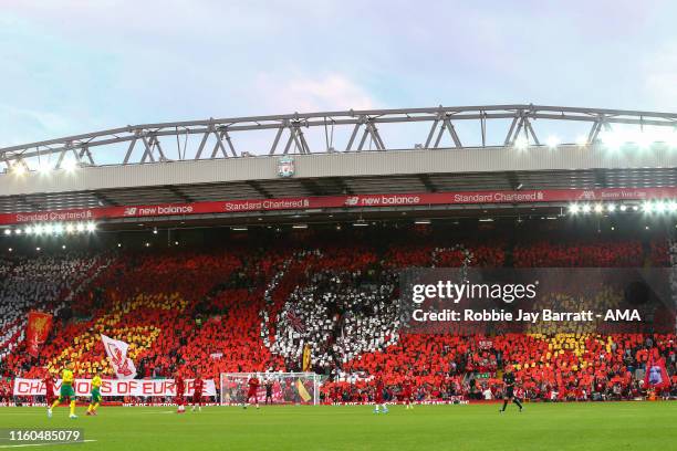 General view of The Kop at Anfield stadium as the fans celebrate winning their sixth UEFA Champions League Trophy with a mosaic during the Premier...