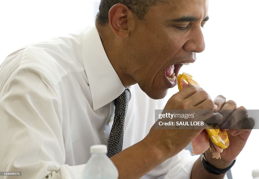 US President Barack Obama eats a "median