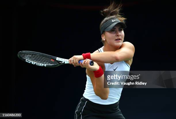Bianca Andreescu of Canada hits a shot against Karolina Pliskova of Czech Republic during a quarterfinal match on Day 7 of the Rogers Cup at Aviva...