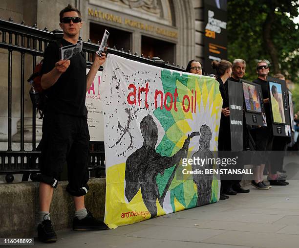 Anti BP protesters gather outside the BP portrait awards 2011, at the National Portrait Gallery in London, on June 14, 2011. AFP PHOTO / BEN STANSALL