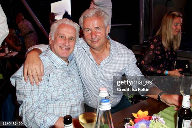 Former mayor of Berlin Klaus Wowereit and his husband Joern Kubicki during the 175th anniversary of Berlin Zoological Garden on August 9, 2019 in...