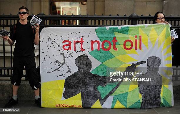 Anti BP protesters gather outside the BP portrait awards 2011, at the National Portrait Gallery in London, on June 14, 2011. AFP PHOTO / BEN STANSALL