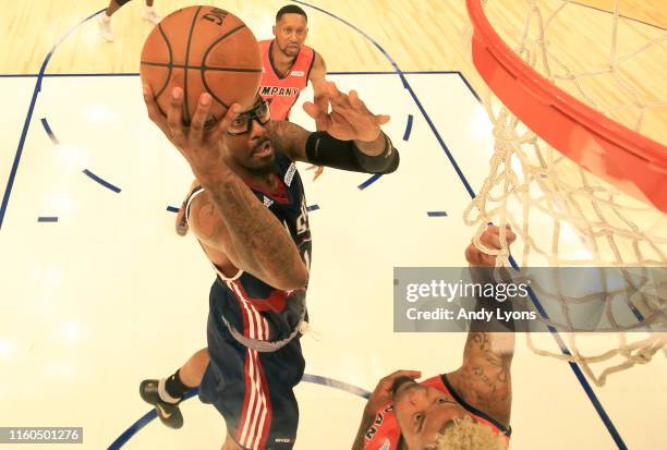 Amar'e Stoudemire of Tri-State takes a shot against 3's Company during week three of the BIG3 three on three basketball league at Legacy Arena at the...