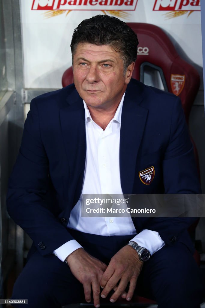 Walter Mazzarri, head coach of Torino FC, looks on before...