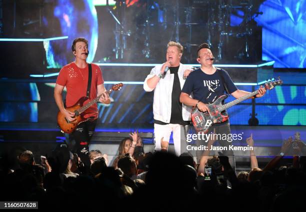 Joe Don Rooney, Gary LeVox and Jay DeMarcus of the band Rascal Flatts perform at Ascend Amphitheater on July 06, 2019 in Nashville, Tennessee.