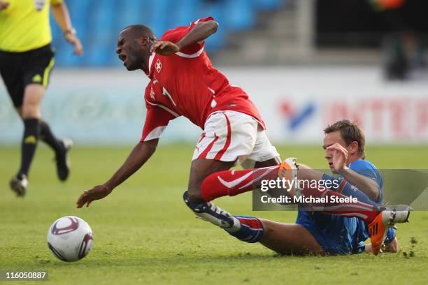 Innocent Emeghara of Switzerland is fouled by Eggert Jonsson during the UEFA European Under-21 Championship Group A match between Switzerland and...