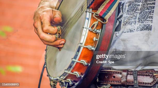 banjo player - banjo stock pictures, royalty-free photos & images