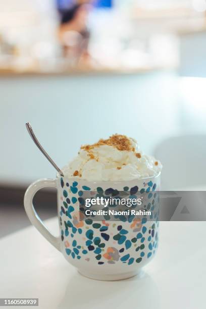 gingerbread hot chocolate in a mug, topped with whipped cream - rovaniemi stock pictures, royalty-free photos & images