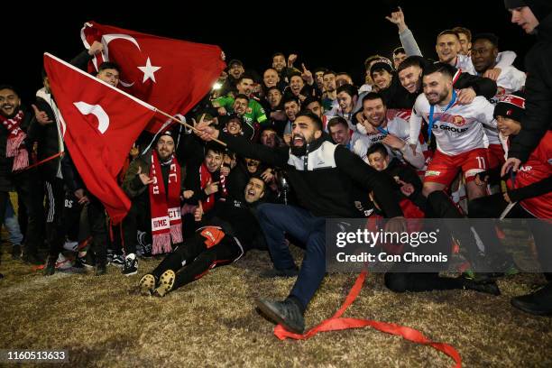 Hume City players celebrate their win with their fans during the 2019 Dockerty Cup Final match between Melbourne Knights and Hume City FC at Kingston...