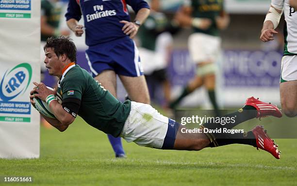 Francois Venter of South Africa scores his second try during the IRB Junior World Championship match between Ireland and South Africa at the Stadio...