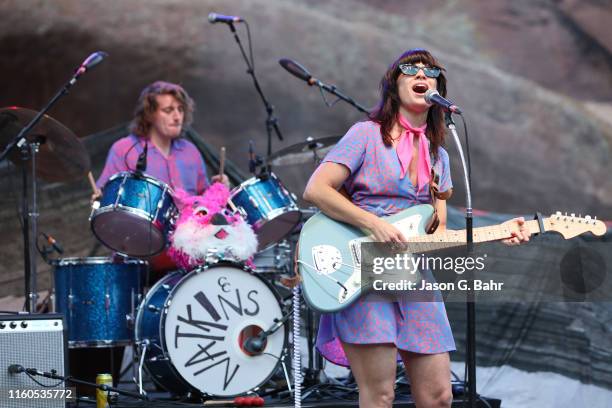 Nicole Atkins sings as Danny Banks plays drums during a performance at Red Rocks on July 06, 2019 in Morrison, Colorado.