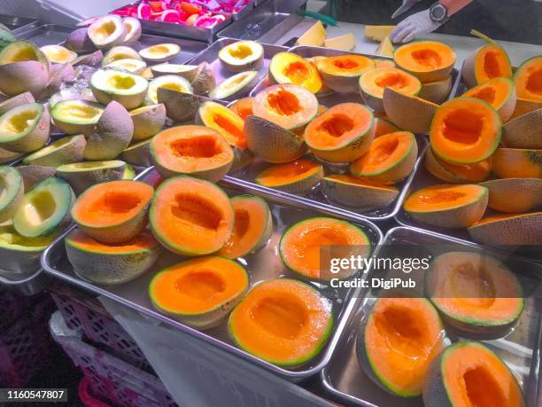halved melons at street food stall during hiratsuka tanabata matsuri 2019 - festival tanabata imagens e fotografias de stock