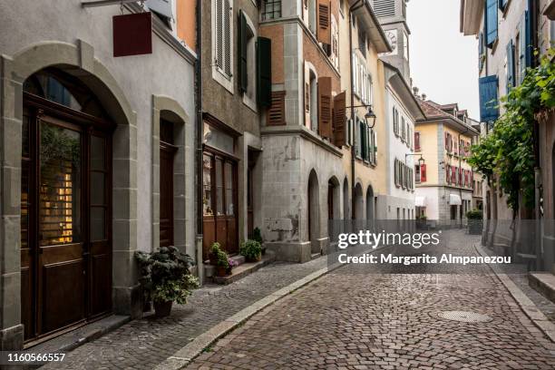 inside the streets of lutry old town - brick pathway stock pictures, royalty-free photos & images