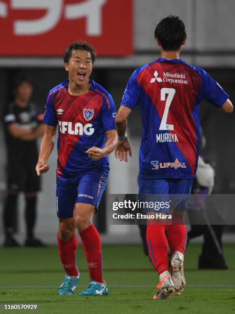 Kensuke Nagai of FC Tokyo celebrates scoring his side's first goal during the J.League J1 match between FC Tokyo and Gamba Osaka at Ajinomoto Stadium...