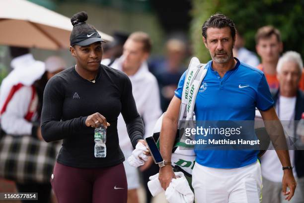 Serena Williams of the United States and her coach Patrick Mouratoglou of the United States seen at Aorangi Park ahead of a practice session during...