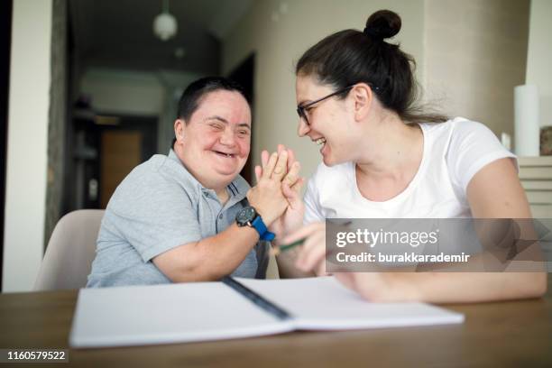 real support - learning disability stock pictures, royalty-free photos & images
