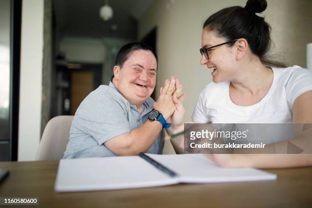 real support - learning disabilities stock pictures, royalty-free photos & images