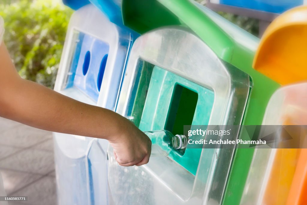 Waste concept; put trash in the garbage, separate waste for taking care environmental