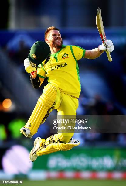 David Warner of Australia celebrates his century during the Group Stage match of the ICC Cricket World Cup 2019 between Australia and South Africa at...