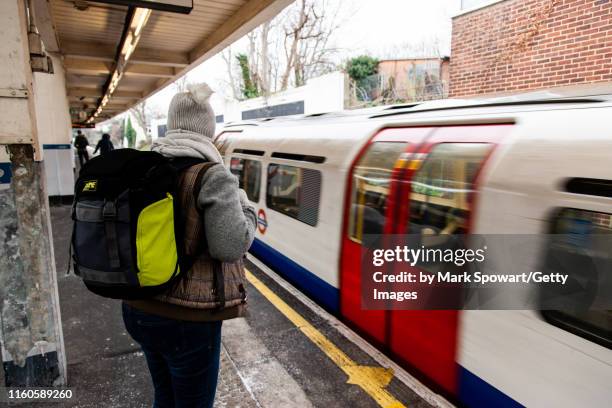 london england subway system - commutors stock pictures, royalty-free photos & images