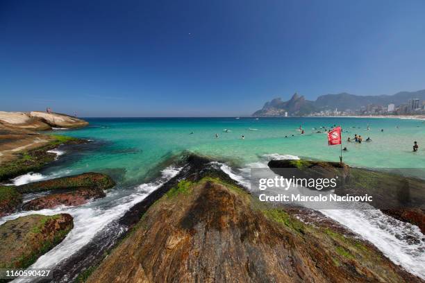 arpoador beach in ipanema, rio de janeiro - arpoador beach stock pictures, royalty-free photos & images