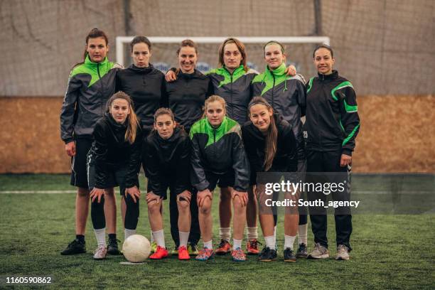 soccer players and their coach - club soccer stock pictures, royalty-free photos & images